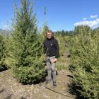 Larch Tree Size person guy standing behind